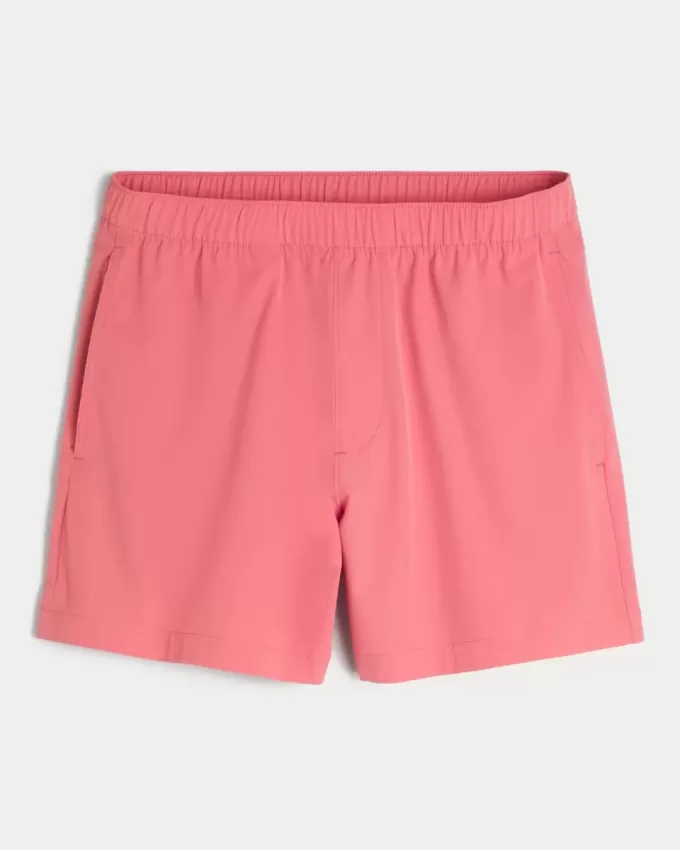 Pantaloncini ibridi attivi a metà coscia