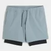 Pantaloncini ibridi attivi a metà coscia