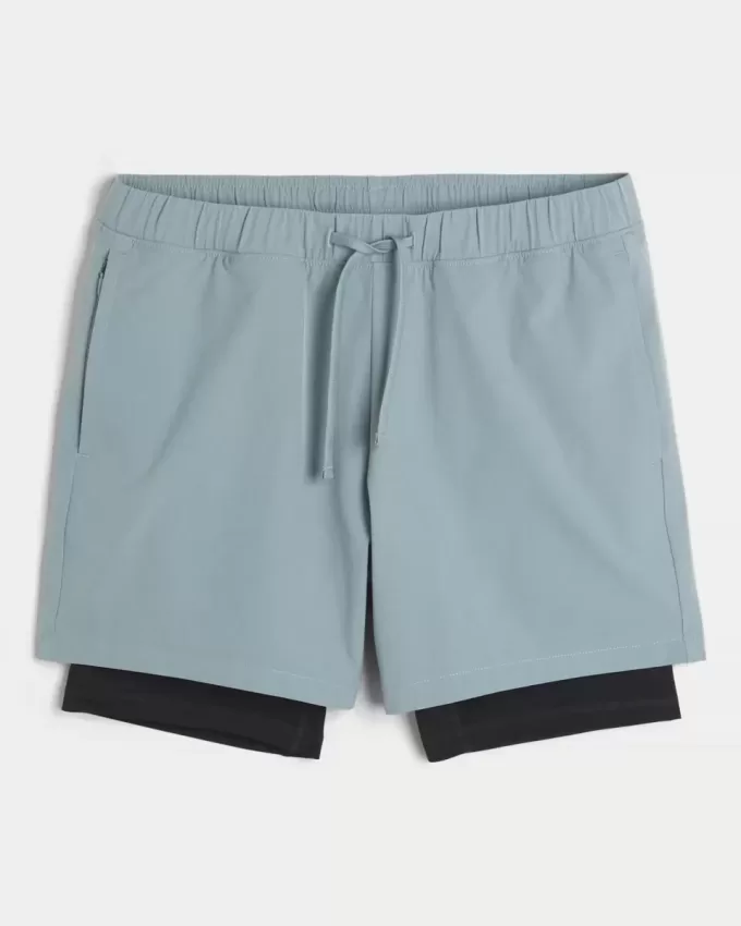 Pantaloncini ibridi attivi a metà coscia