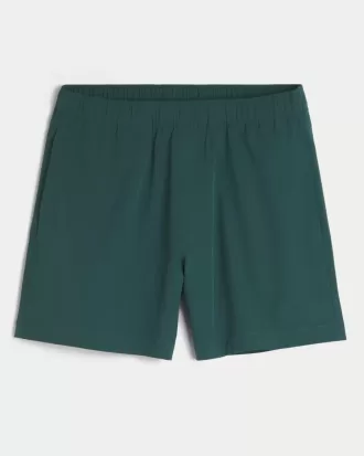 Pantaloncini ibridi attivi a metà coscia
