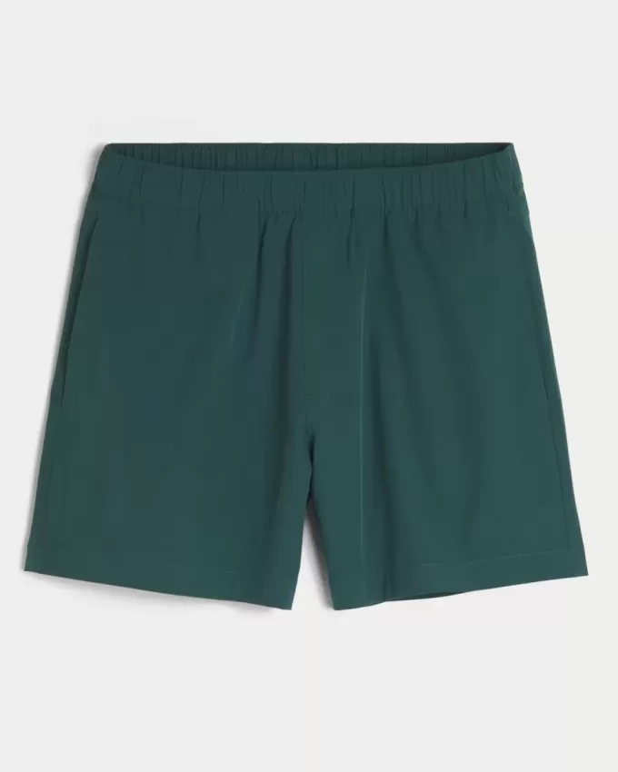 Pantaloncini ibridi attivi a metà coscia