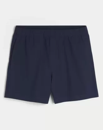Pantaloncini ibridi attivi a metà coscia