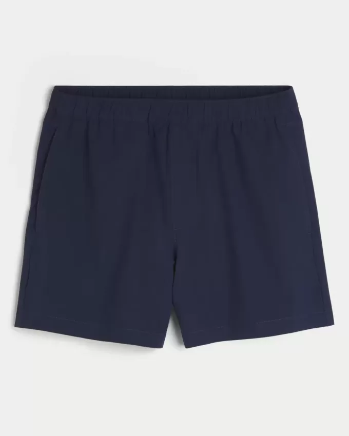 Pantaloncini ibridi attivi a metà coscia