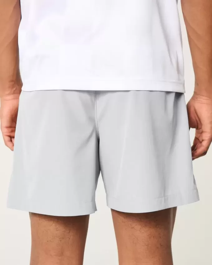 Pantaloncini ibridi attivi a metà coscia