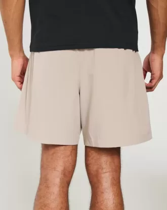 Pantaloncini ibridi attivi a metà coscia