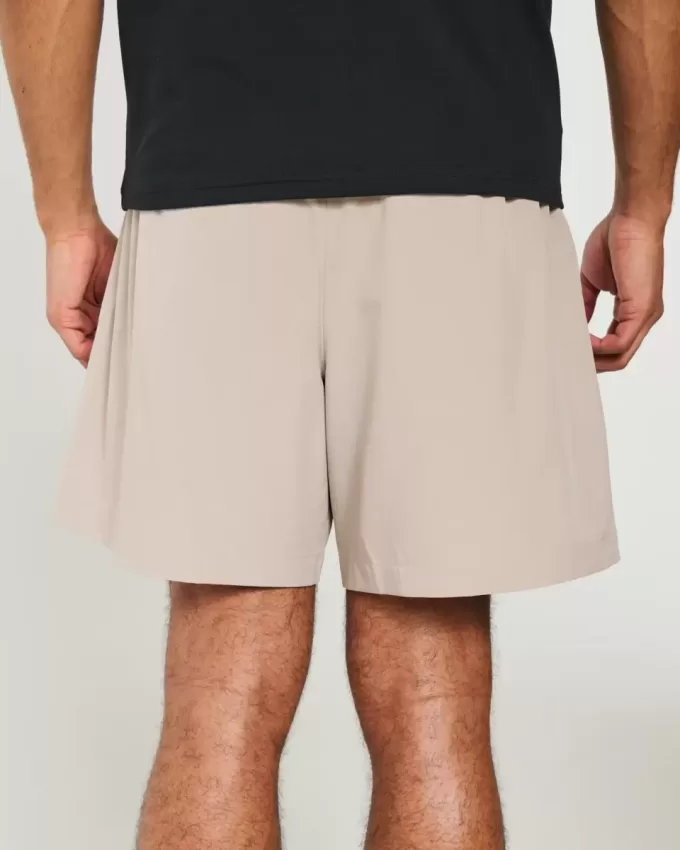 Pantaloncini ibridi attivi a metà coscia