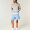 Pantaloncini ibridi attivi a metà coscia