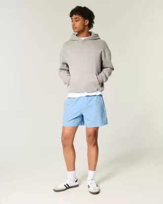 Pantaloncini ibridi attivi a metà coscia