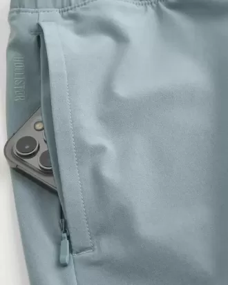Pantaloncini ibridi attivi a metà coscia