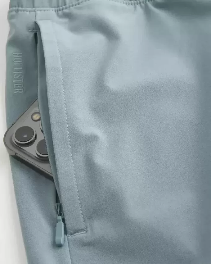 Pantaloncini ibridi attivi a metà coscia