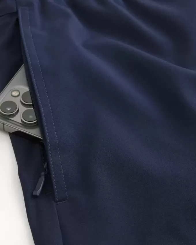 Pantaloncini ibridi attivi a metà coscia