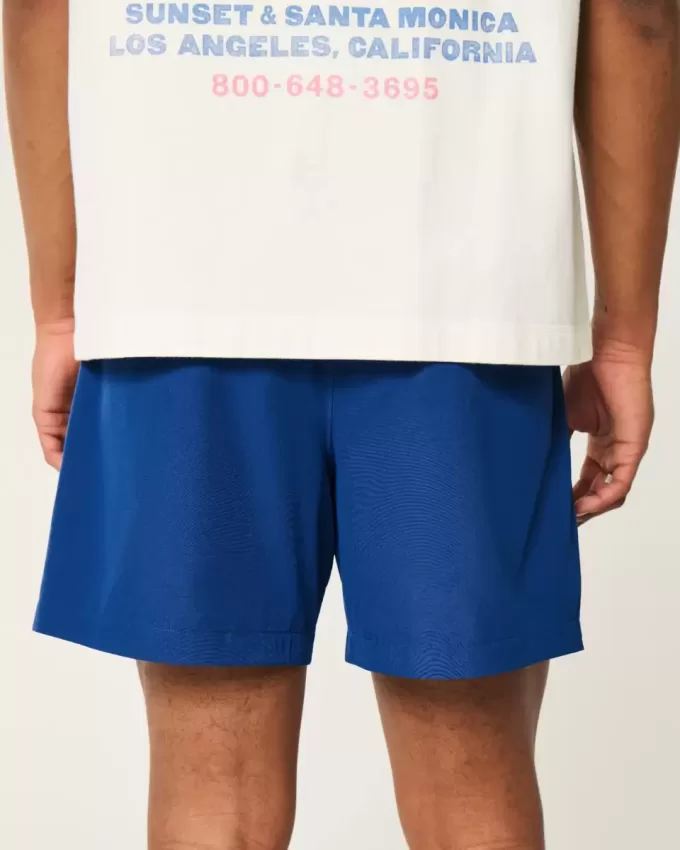 Pantaloncini ibridi attivi a metà coscia