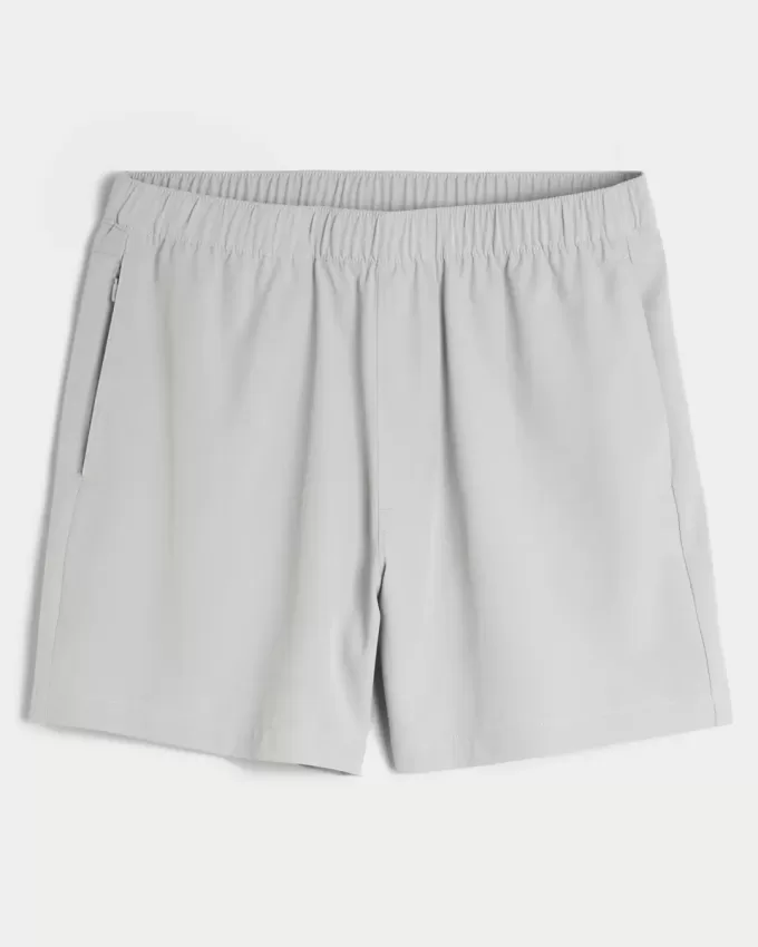 Pantaloncini ibridi attivi a metà coscia