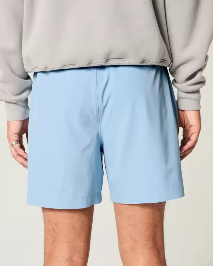 Pantaloncini ibridi attivi a metà coscia