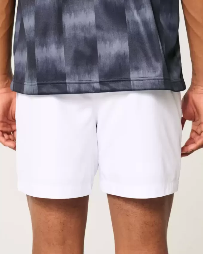 Pantaloncini ibridi attivi a metà coscia