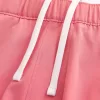 Pantaloncini ibridi attivi a metà coscia