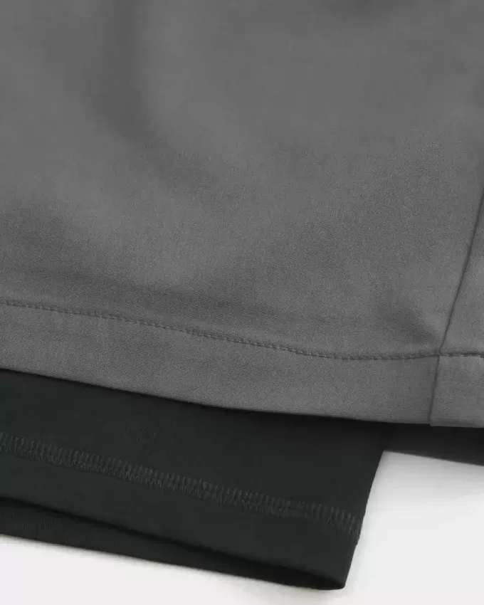 Pantaloncini ibridi attivi a metà coscia