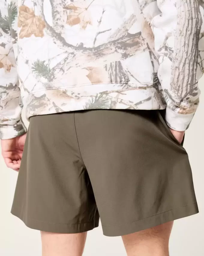 Pantaloncini ibridi attivi a metà coscia