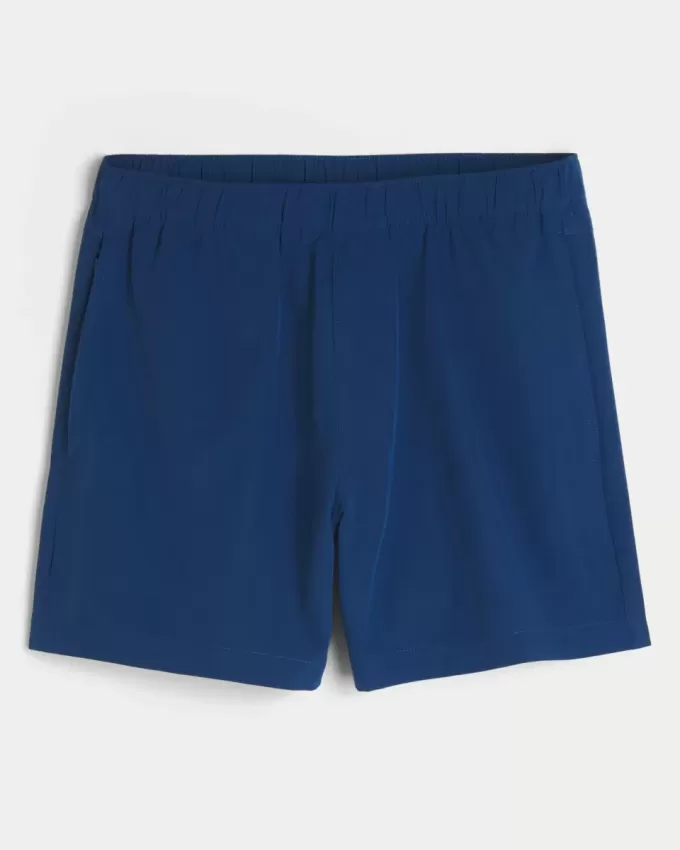 Pantaloncini ibridi attivi a metà coscia