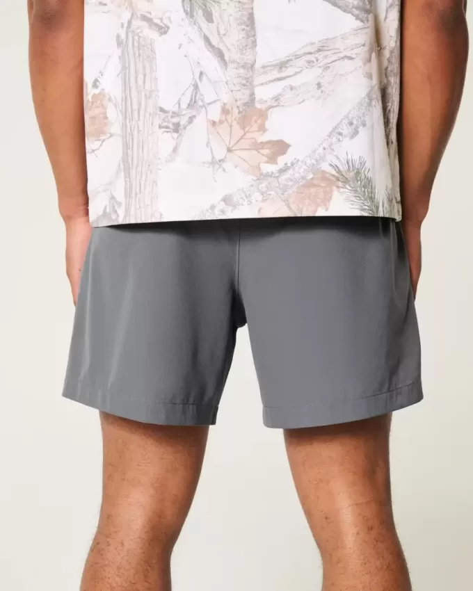 Pantaloncini ibridi attivi a metà coscia