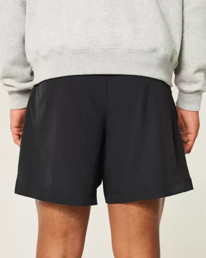 Pantaloncini ibridi attivi a metà coscia