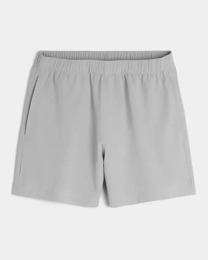 Pantaloncini ibridi attivi a metà coscia