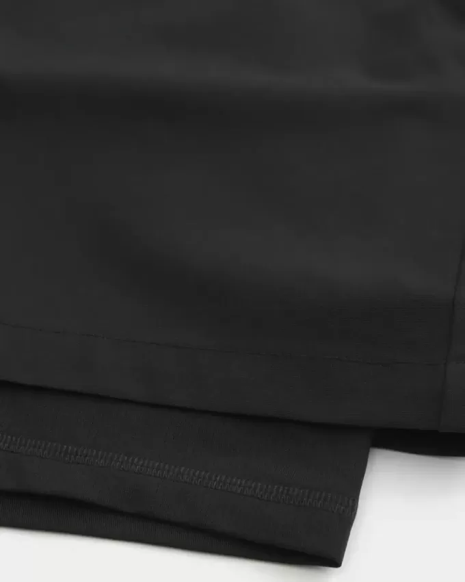 Pantaloncini ibridi attivi a metà coscia