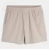 Pantaloncini ibridi attivi a metà coscia