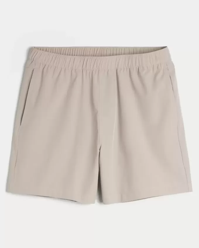 Pantaloncini ibridi attivi a metà coscia