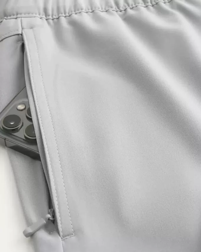 Pantaloncini ibridi attivi a metà coscia