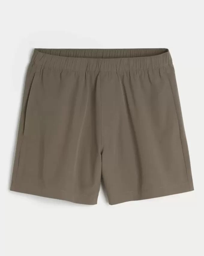 Pantaloncini ibridi attivi a metà coscia