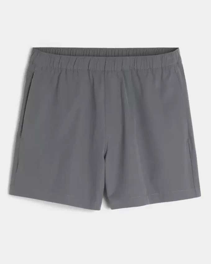Pantaloncini ibridi attivi a metà coscia