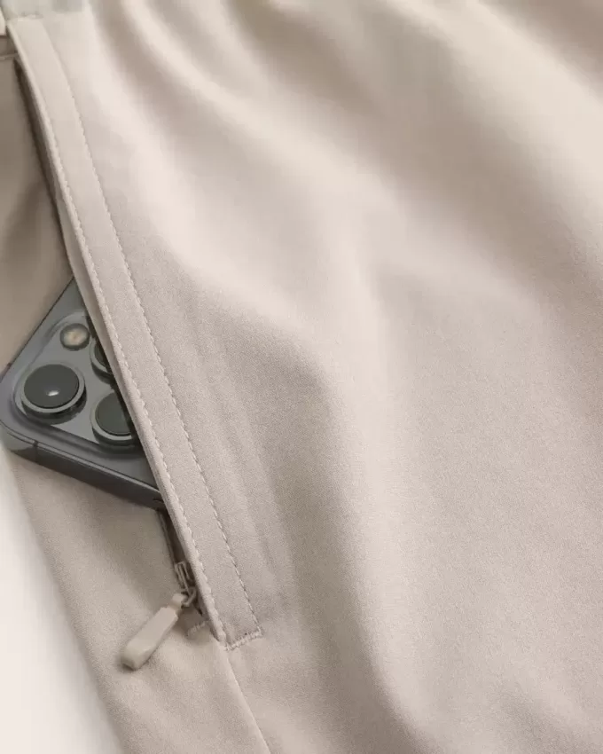 Pantaloncini ibridi attivi a metà coscia
