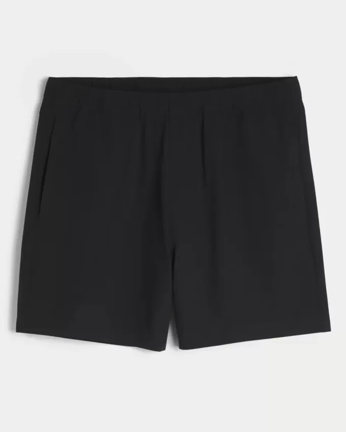 Pantaloncini ibridi attivi a metà coscia
