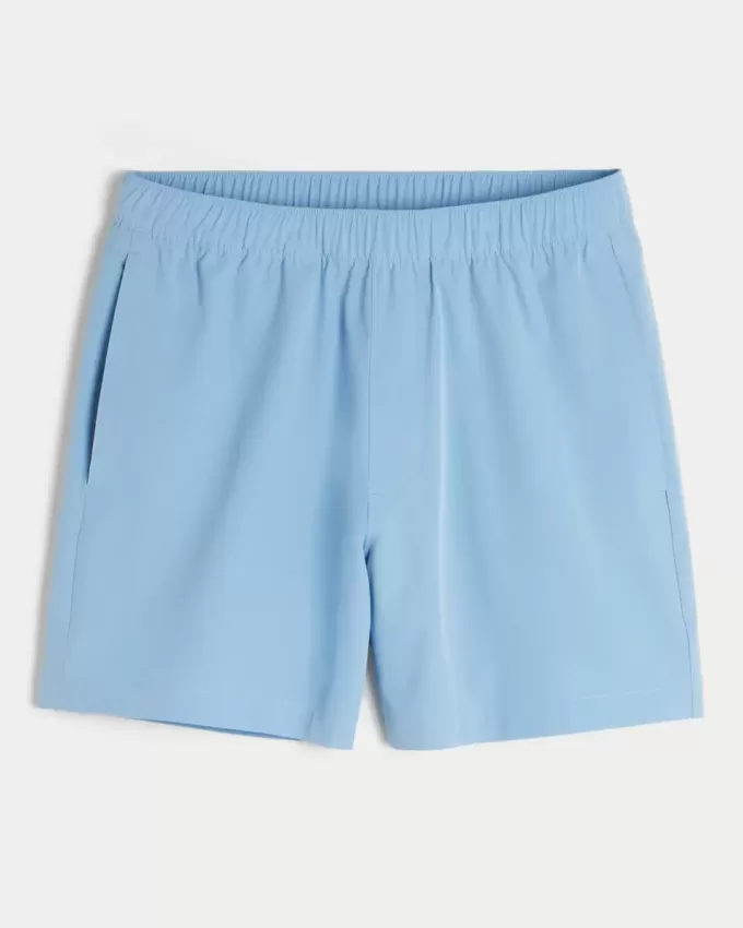 Pantaloncini ibridi attivi a metà coscia
