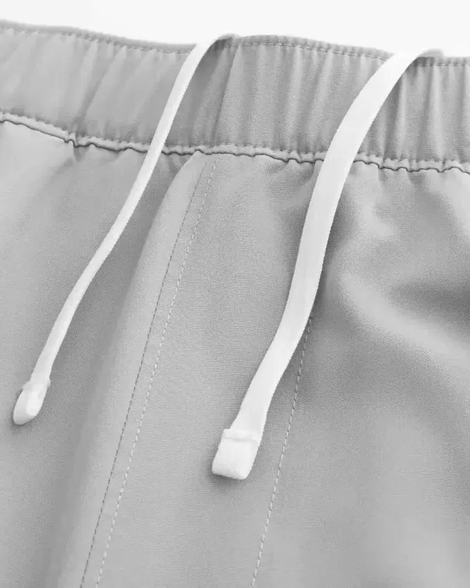 Pantaloncini ibridi attivi a metà coscia