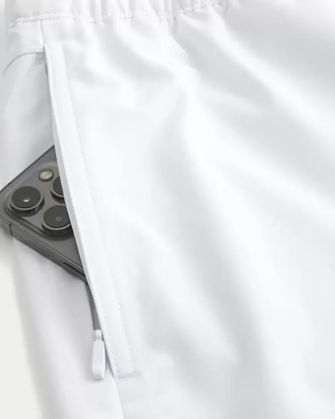 Pantaloncini ibridi attivi a metà coscia