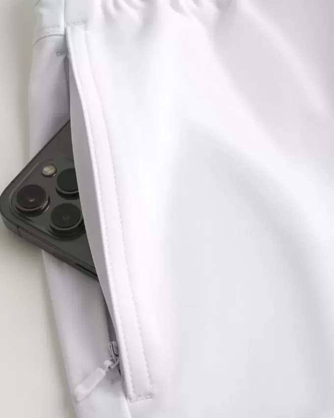 Pantaloncini ibridi attivi a metà coscia