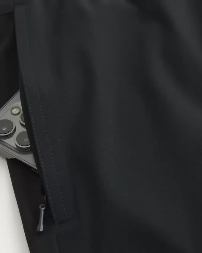 Pantaloncini ibridi attivi a metà coscia