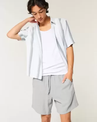 Pantaloncini in cotone stropicciato sopra il ginocchio