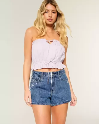 Pantaloncini in denim a trapezio con ricamo floreale e vita alta, lavaggio medio