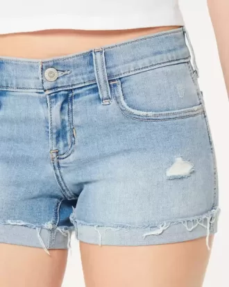 Pantaloncini in denim chiaro effetto used a vita bassa