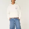Pantaloncini in denim larghi da pittore con lavaggio medio