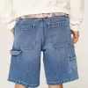 Pantaloncini in denim larghi da pittore con lavaggio medio
