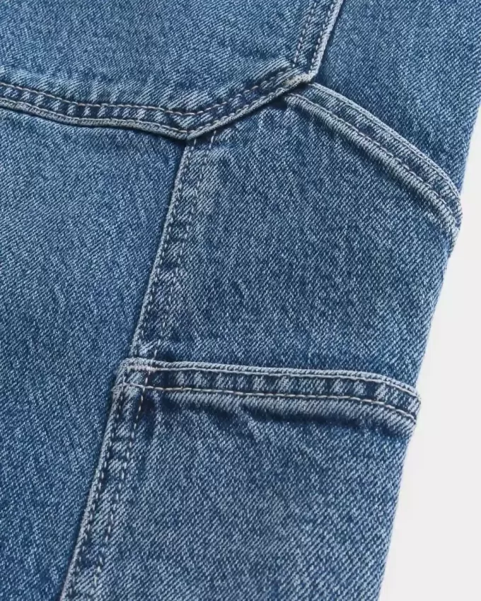 Pantaloncini in denim larghi da pittore con lavaggio medio