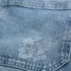 Pantaloncini in denim super larghi con grafica a teschio