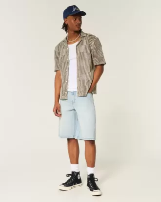 Pantaloncini in denim super larghi con grafica Dice e lavaggio chiaro