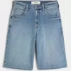 Pantaloncini in denim super larghi con lavaggio medio