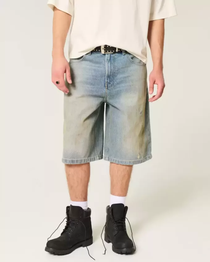 Pantaloncini in denim super larghi con lavaggio medio ingrassato