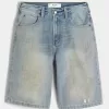 Pantaloncini in denim super larghi con lavaggio medio ingrassato